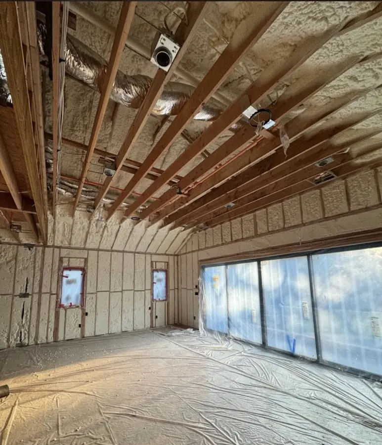 Interior walls and ceiling insulated with spray foam during new construction in South San Gabriel